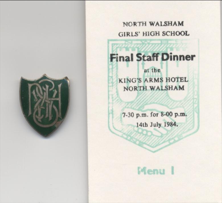 Photograph. Badges N.W.G.H.S. for 1940's and 1980's (North Walsham Archive).