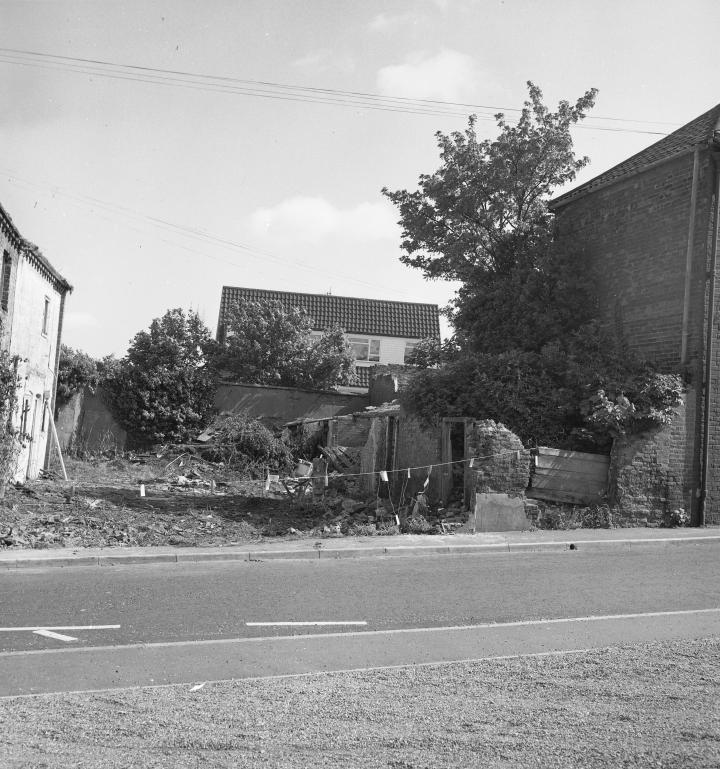 Photograph. Demolition of buildings on corner of Mundesley Road and Vicarage Street (North Walsham Archive).