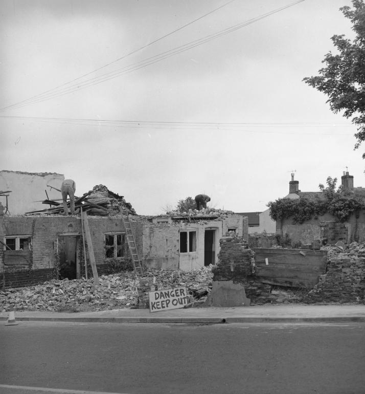 Photograph. Demolition of buildings on corner of Mundesley Road and Vicarage Street (North Walsham Archive).