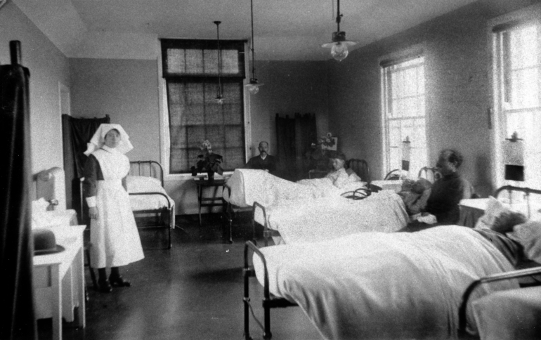 Photograph. Men's Ward at North Walsham Cottage Hospital (North Walsham Archive).